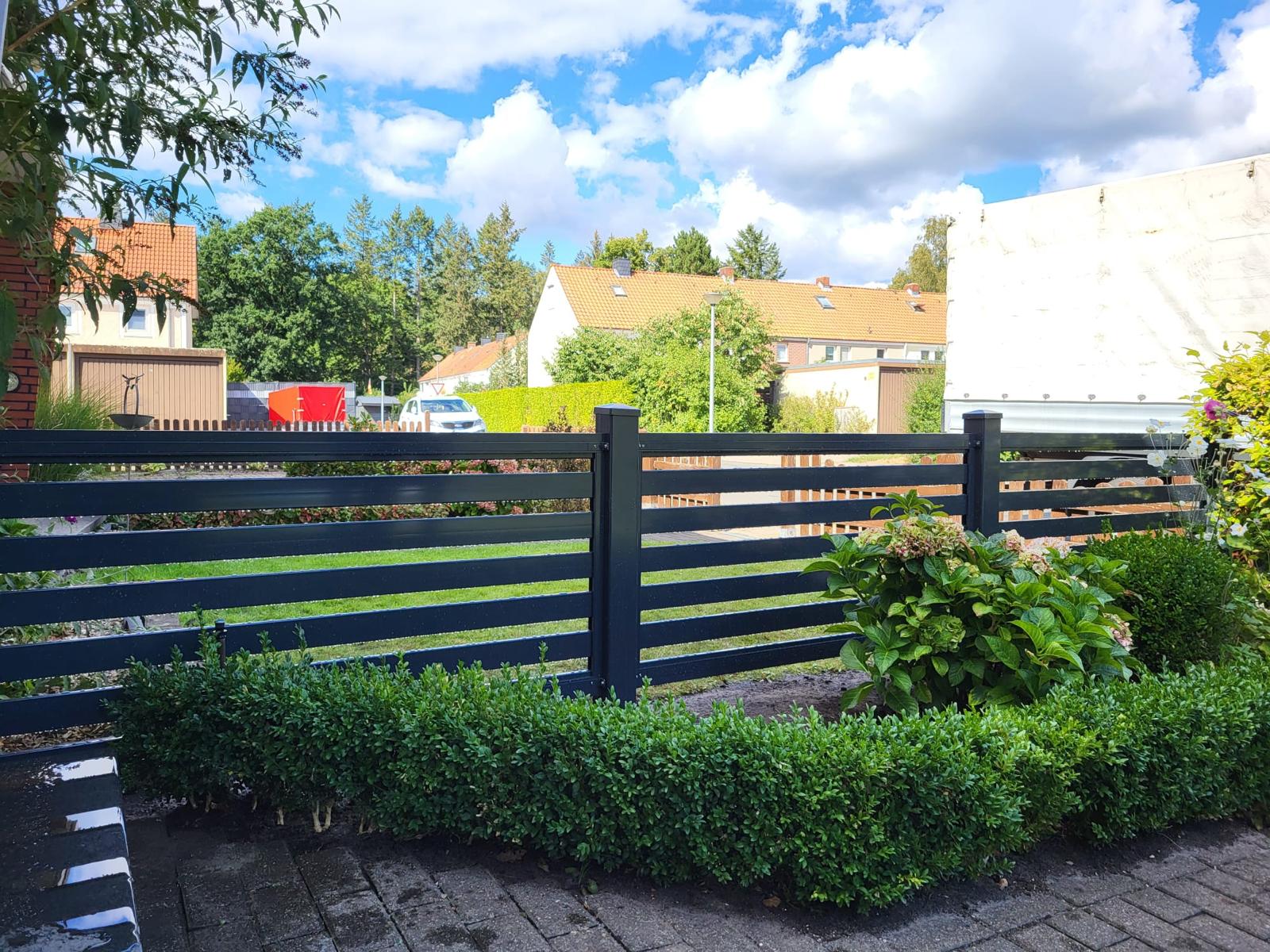 Holzzaun mit Sichtschutz in Celle